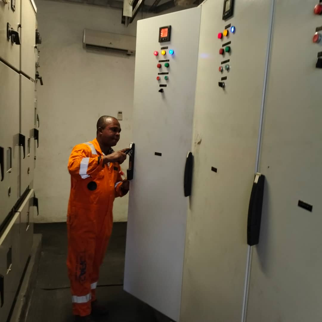 Engineer servicing 11kV switch panels